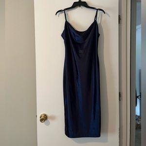 calf length, navy blue dress with slit on the side